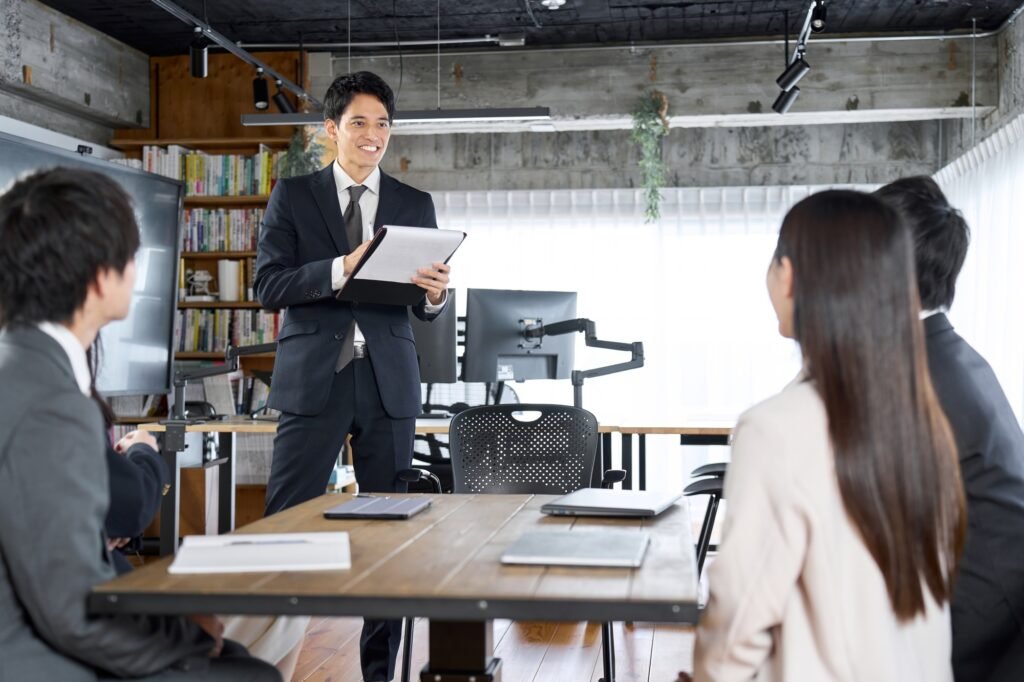 Businessman working as a team leader at a meeting